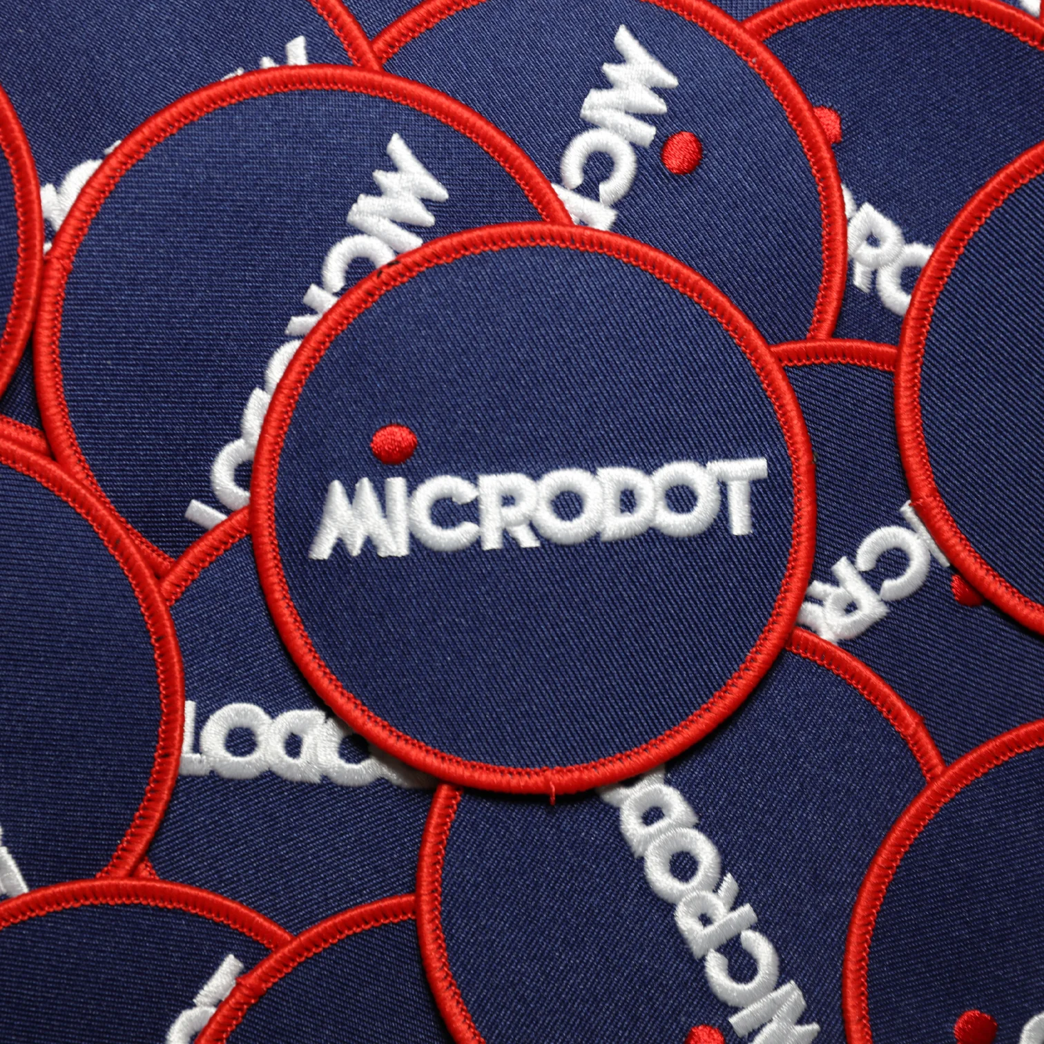 Microdot Logo Woven Patch - New Item